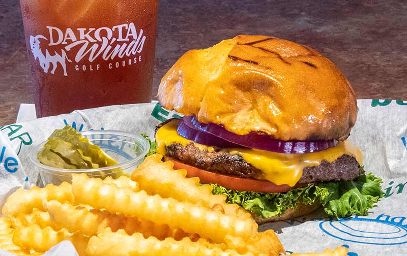 Dakota Winds Tavern - Burger with Fries Iced Tea Close Up